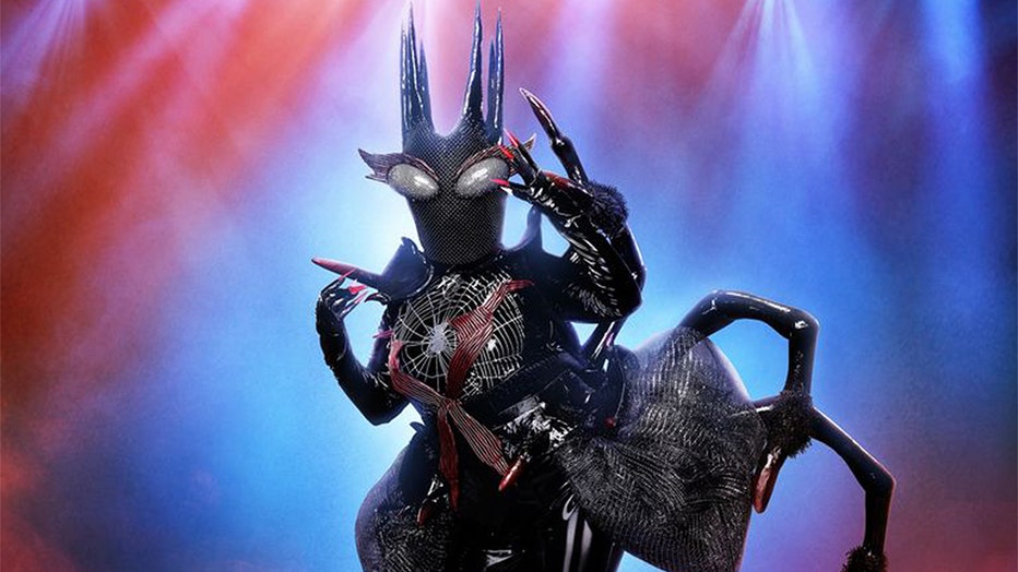 Crawl to your television screens to catch the black widow on “The Masked Singer” Wednesdays on FOX at 8 p.m. ET/PT.