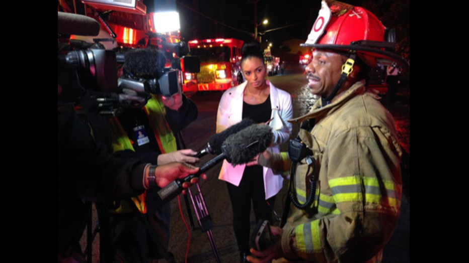 DeKalb Fire Rescue Captain Eric Jackson speaks with reporters