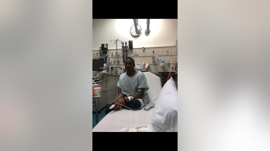 DeKalb Firefighter Captain Eric Jackson sits in the acute care center, where he was diagnosed with blood clots in his lungs.