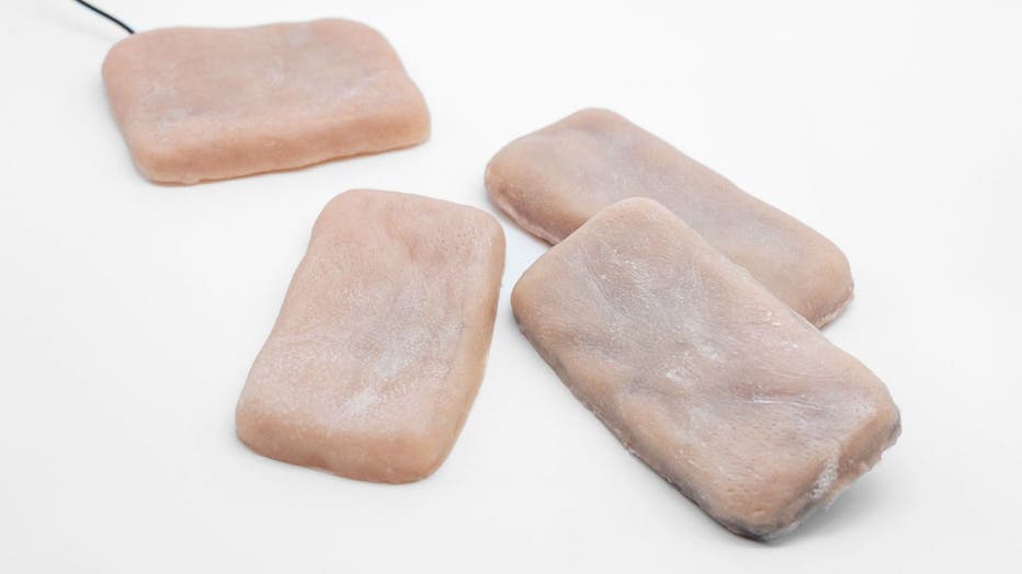 These creepy artificial skin cases makes phones pinchable ticklish