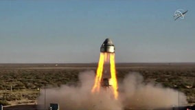 Boeing's new space capsule launches mile into air on test flight