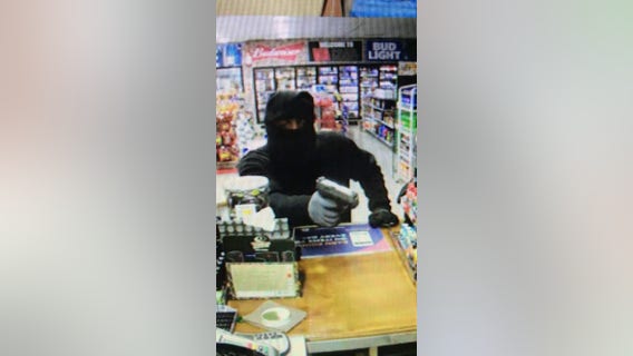 Carrollton police searching suspect in convenience store robbery