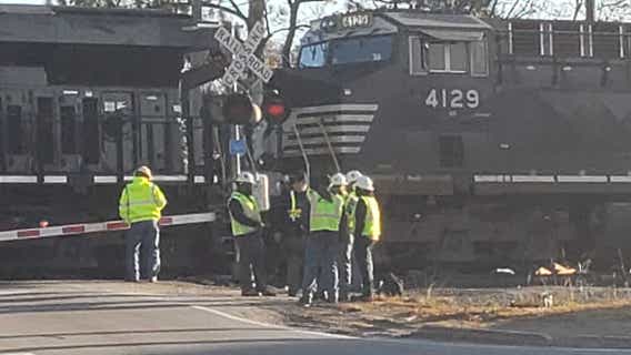 Truck, train collide in Clayton County