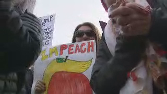 Anti-Trump protesters fill Centennial Olympic Park