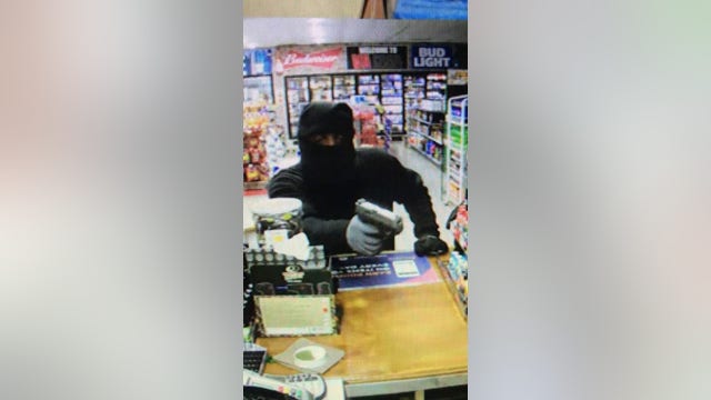Carrollton police searching suspect in convenience store robbery