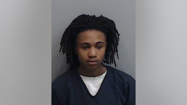 Teen arrested after guns found in bag