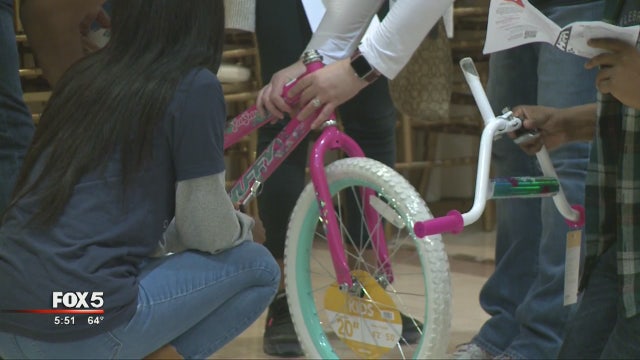 Credit union assembled bikes for military children