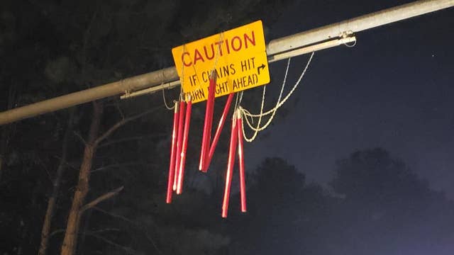 Cars damaged by warning system to protect historic covered bridge