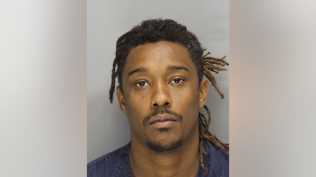 Police: Georgia man throws children over fence while fleeing