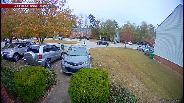 Woman carjacked at gunpoint in her own driveway