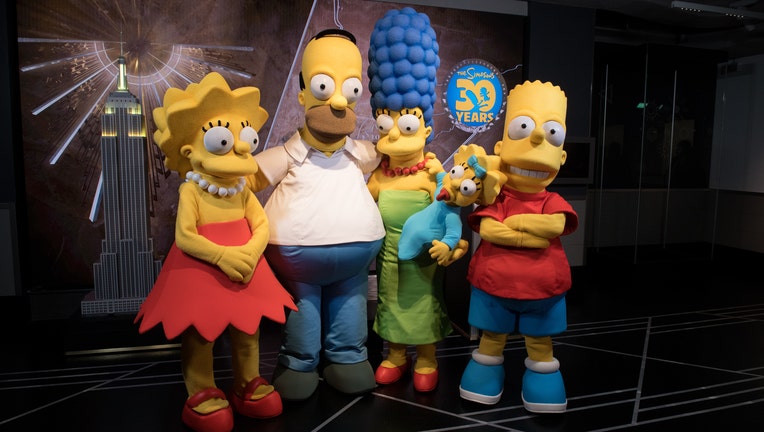 Actors dressed as members of the Simpsons Family in 