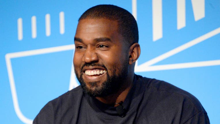 Kanye West speaks on stage at the