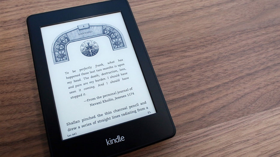 An e-book is displayed on a Kindle device. Macmillan Publishing, one of the top five U.S. publishers, announced that it will be restricting libraries' e-book purchases during the first eight weeks after publication.