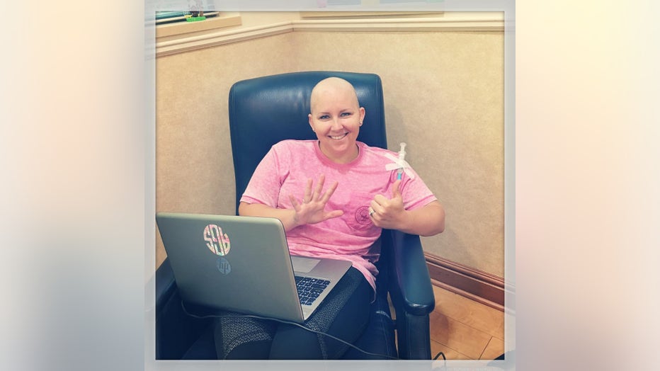 Ashley Gunter sits in chemotherapy infusion room.