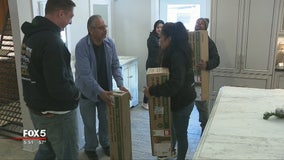 Kennesaw company donates Christmas trees to families