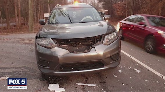 Douglasville mom's car slammed by washing machine in hit-and-run