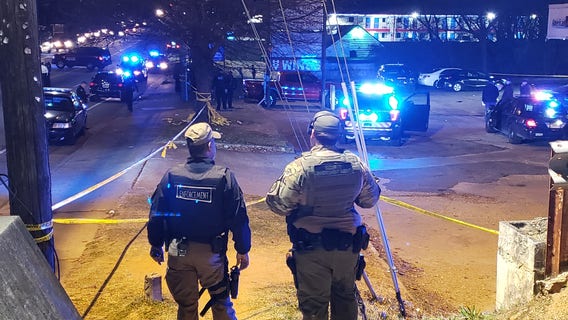 Police: Mother gunned down in front of son