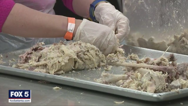 Volunteers prep for Hosea Helps' annual Christmas dinner