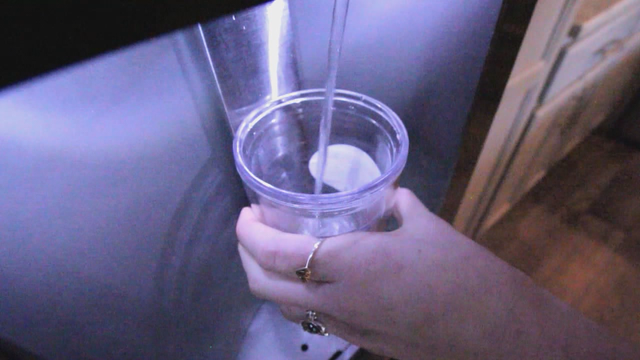 Police: Elected official's wife dumped drink on reporter