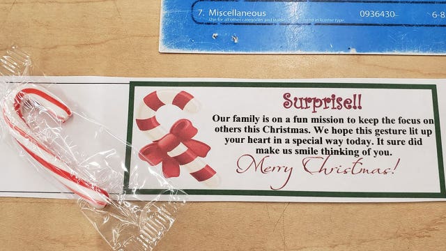 Boy’s adorable candy-cane gram shows love for exhausted retail workers during busy holiday season