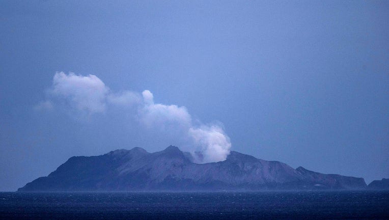 WHAKATANE, NEW ZEALAND - DECEMBER 10: Smoke and ash rises from a volcano on White Island early in the morning on December 10, 2019.