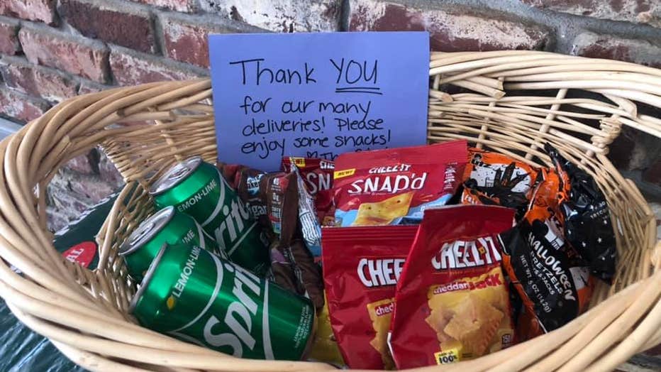 Ga. family surprises delivery driver with basket of goodies