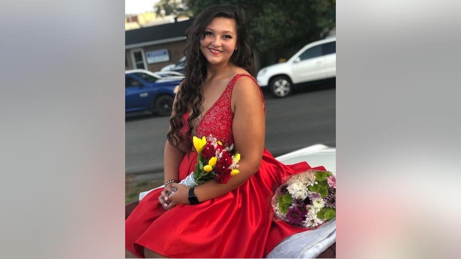 Anna Valle poses in homecoming parade