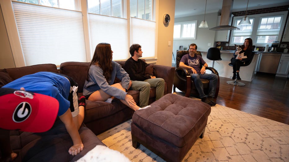 Family gathers in living room