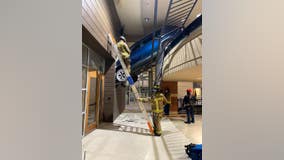 Crews rescue woman who drove off parking deck near Target in Buckhead