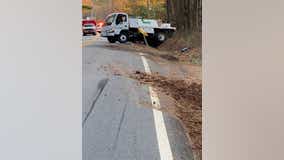 Truck overturns, spills hundreds of gallons of lawn chemical onto roadway