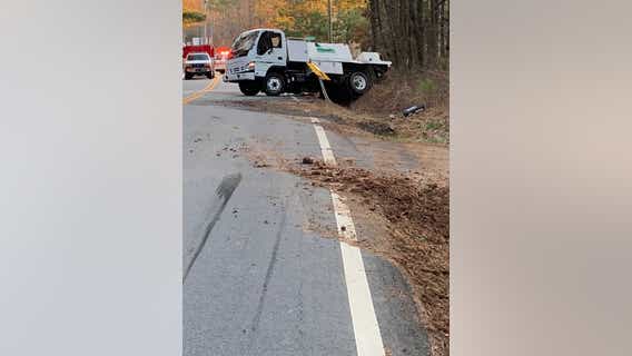 Truck overturns, spills hundreds of gallons of lawn chemical onto roadway