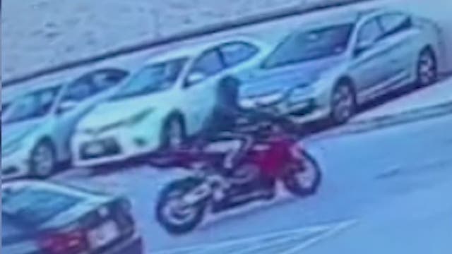 Police: Motorcyclist tried to break into car using spark plug