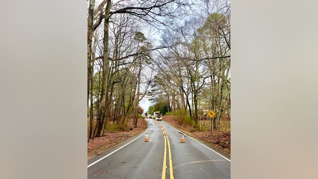 Gas main break shuts down road in Cherokee County