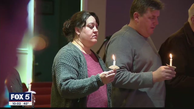 Community gathers in prayer to mourn 8 lives lost in dock fire