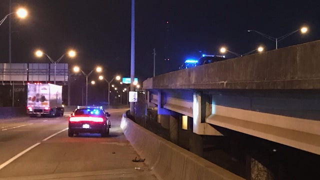 Man jumps off I-85 to escape police