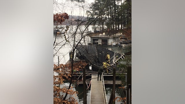 Officials investigating boat dock fire in Hall County