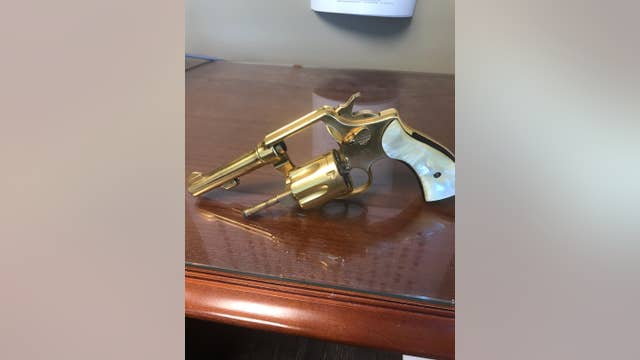 Used for both good and evil, golden gun finally comes home
