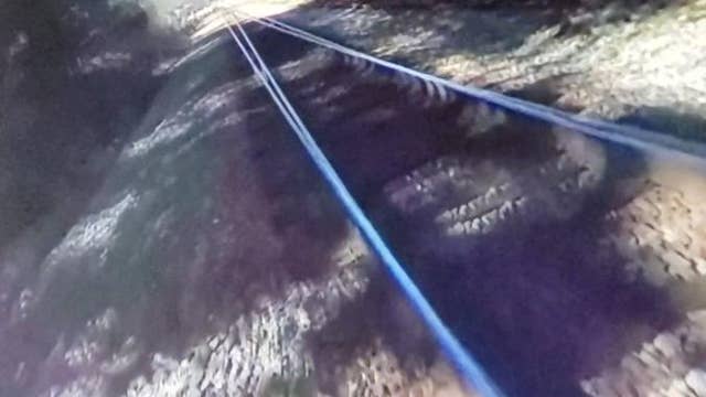 New body cameras show the moment officer was hit by train