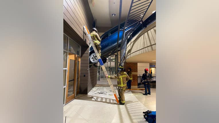 Crews Rescue Woman Who Drove Off Parking Deck Near Target In