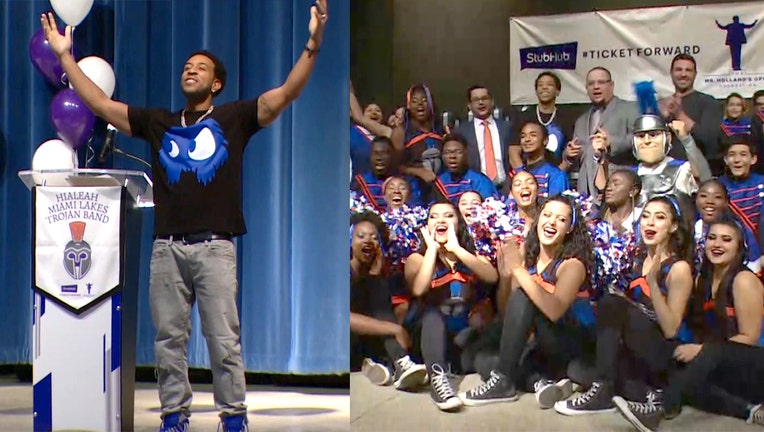 Rapper Ludacris surprises students at Hialeah-Miami Lakes Senior High School with $75,000 worth of musical instruments.