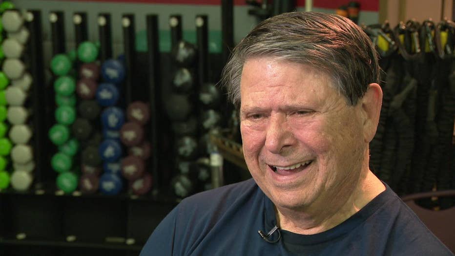 Man smiles during interview