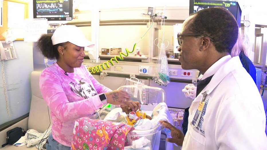 Mother and doctor talk in NICU