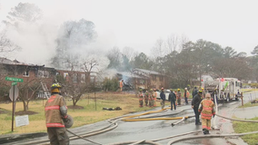 Fire rips through Clayton County family's home and vehicles