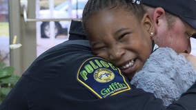 4-year-old hugs Griffin police officer after mom tells her officers are her 'friends'