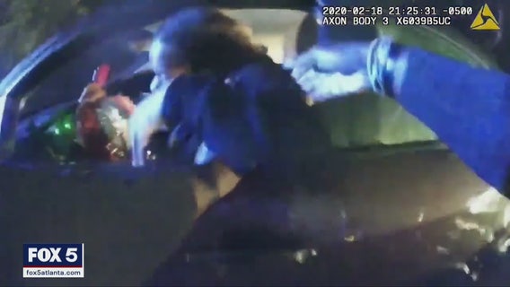 Atlanta police officer rescues brother, sister from flooding car