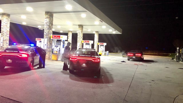 Police: Wounded man shows up at gas station
