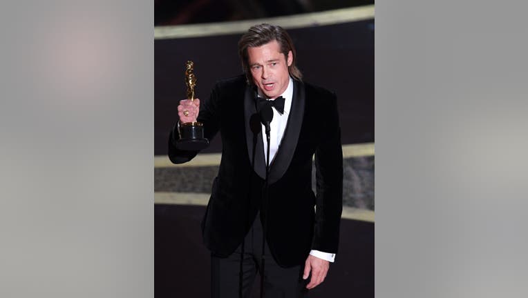 HOLLYWOOD, CALIFORNIA - FEBRUARY 09: Brad Pitt accepts the Actor in a Supporting Role award for 'Once Upon a Time...in Hollywood' onstage during the 92nd Annual Academy Awards at Dolby Theatre on February 09, 2020 in Hollywood, California. (Photo by Kevin Winter/Getty Images)