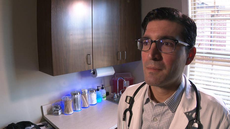 Doctor talks to camera