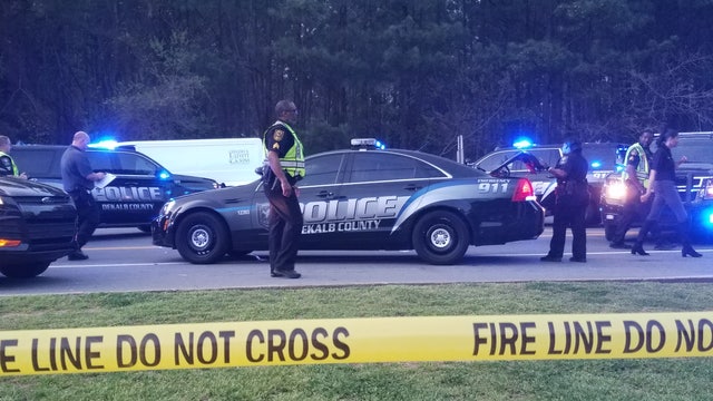Police: Woman struck, killed  by car in DeKalb County