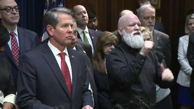 Schools should consider closing as early as Friday, governor says